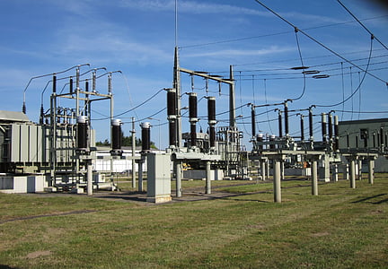 gray electric transmission under blue sky thumbnail