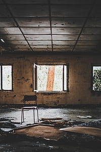 open window on abandoned building thumbnail