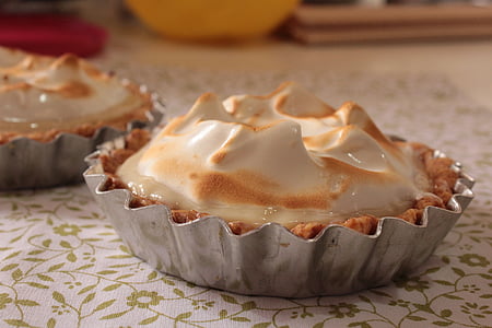 pie on top of white and green floral table thumbnail