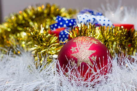 close-up photo of red bauble and yellow tinsel thumbnail