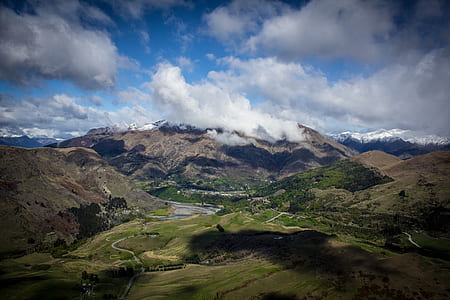 mountain under cloudy sky thumbnail