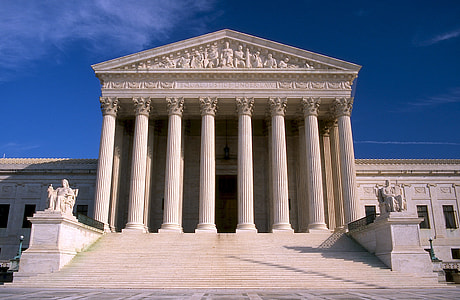 landscape photo of white building with pillars thumbnail