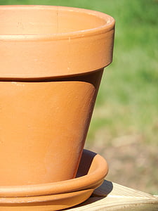 close-up photography of brown clay pot on outdoors thumbnail