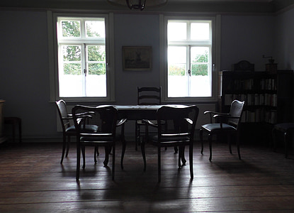 dining table beside window and bookshelf thumbnail
