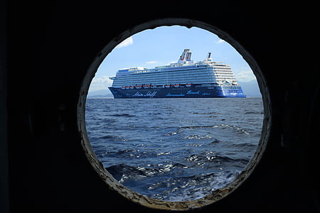 white and blue cruise ship on water thumbnail