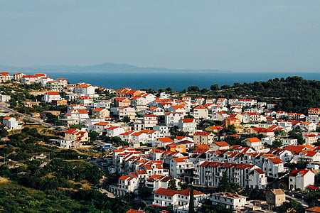 aerial photography of white buildings thumbnail