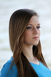 Woman in Blue V Neck Shirt thumbnail