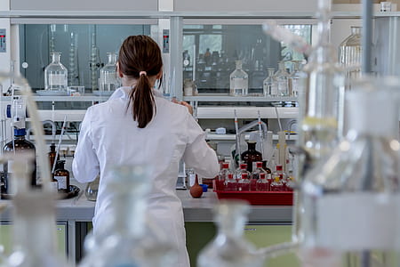 person wearing white laboratory coat thumbnail