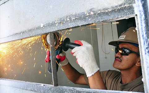 man using angle grinder thumbnail