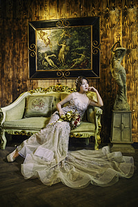 woman sitting on couch thumbnail