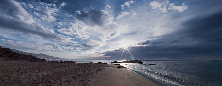 photo of a shoreline during daytime thumbnail