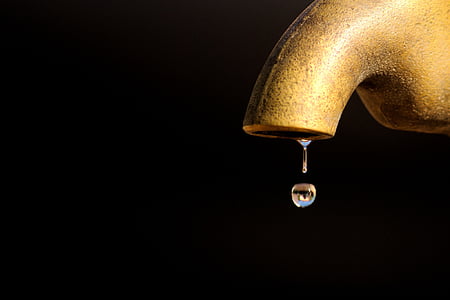water dew drop in brown water faucet thumbnail