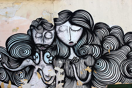 two women with closed eyes illustration on concrete surface thumbnail