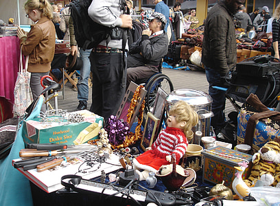 people on a garage sale during day thumbnail