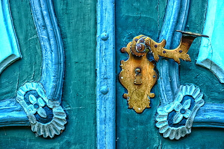 closed gold and gray door thumbnail