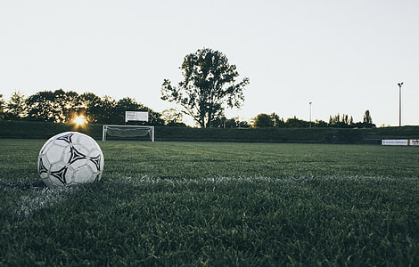 Black and White Soccer Ball on Grass thumbnail