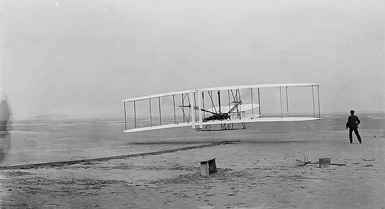 grayscale photo of a vintage airplane thumbnail