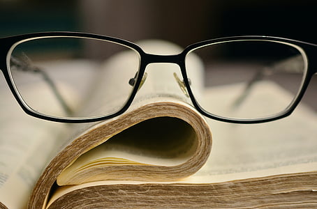 black frame eyeglasses on book page thumbnail