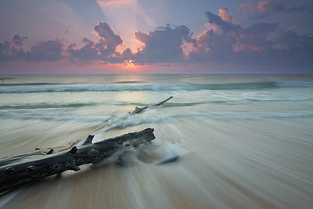 body of water under sky thumbnail