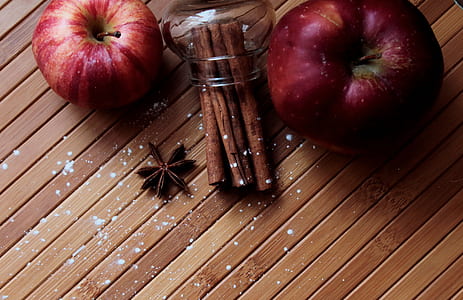 two apple fruits on brown wooden surface thumbnail