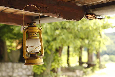 selective focus photography of tubular lantern thumbnail