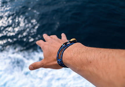person reaching the water thumbnail