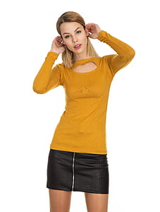 woman wearing orange long-sleeved shirt and black miniskirt thumbnail