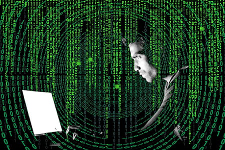 man in front of computer thumbnail