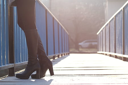 Woman Standing on Bridge thumbnail