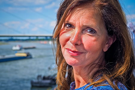 woman wearing blue top thumbnail
