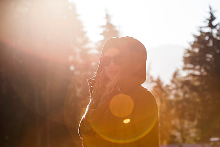 woman wearing brown hoodie during sunshine thumbnail