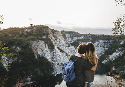 two person standing front of mountain thumbnail