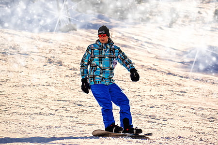 photo of man in snowboard during daytime thumbnail