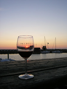 wine glass on wood plank thumbnail
