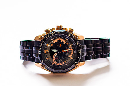 round black and gold-colored chronograph watch with link bracelet thumbnail