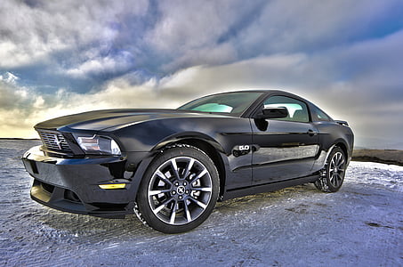 black coupe under white sky thumbnail