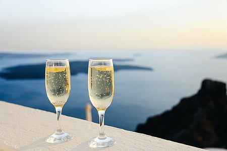 two drinking glasses on top of white surface thumbnail