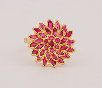 gold-colored with purple gemstone flower pendant thumbnail