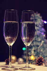 two champagne flutes half filled thumbnail