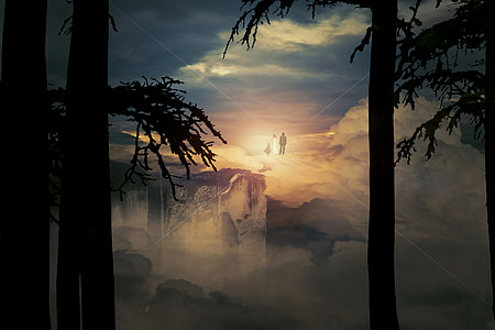 silhouette photo of two person walking on clouds during golden hour thumbnail