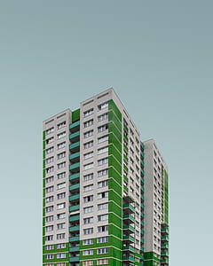 high-rise building under blue sky thumbnail