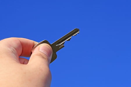 person holding key thumbnail