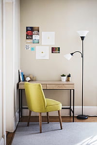 black 2-light torchiere lamp beside table thumbnail