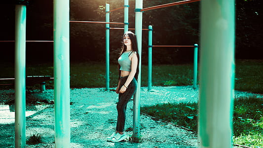 woman leaning on the pole thumbnail
