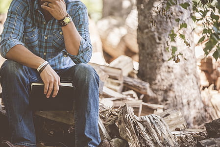 man wearing blue, black, and white plaid sport shirt thumbnail