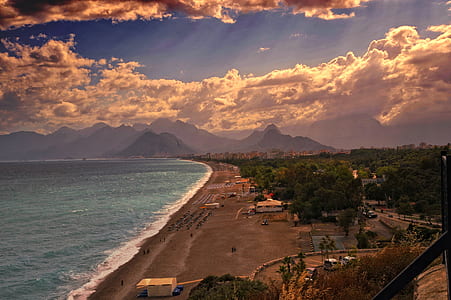 aerial view of seashore during sunset thumbnail