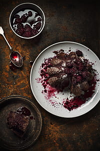 food on white plate beside two gray plates thumbnail