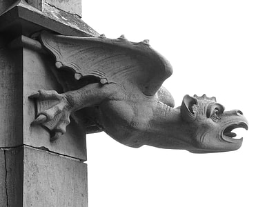 focus photography of gargoyle during daytime thumbnail