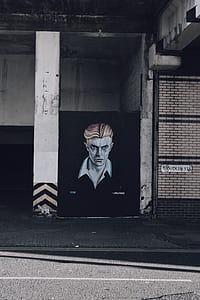 portrait painting of man wearing black and white collared top thumbnail