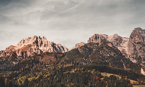 mountain reflecting on body of water thumbnail